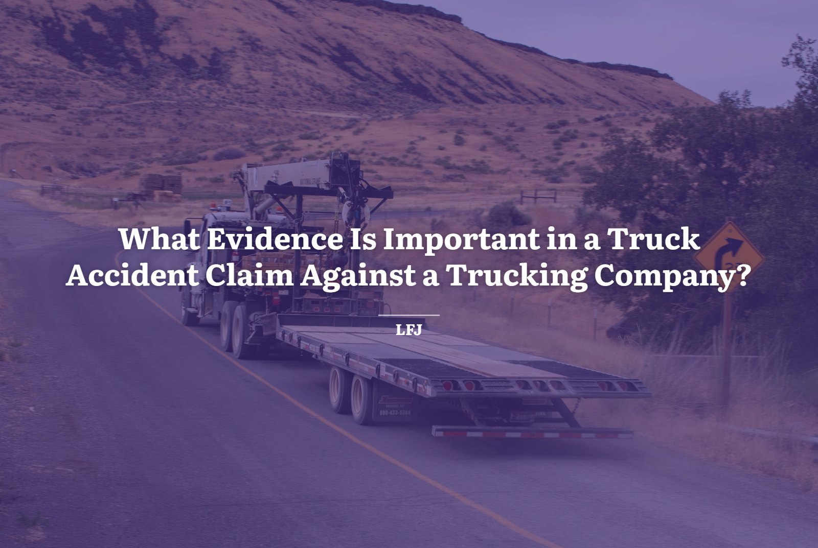 Semi truck with a flatbed trailer on a highway